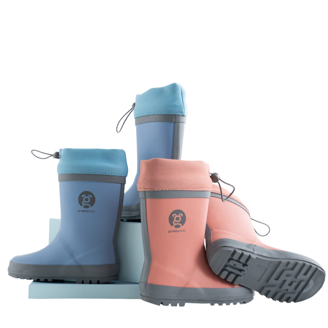 All natural rubber gumboots with neoprene top. Made by Grubbybub and come in either blue or pink.