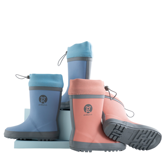 All natural rubber gumboots with neoprene top. Made by Grubbybub and come in either blue or pink. 