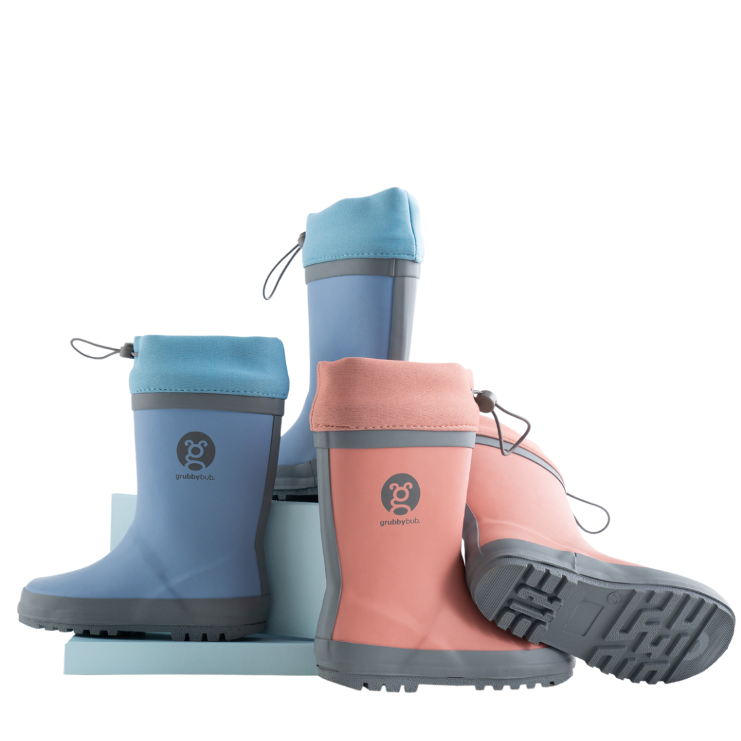 All natural rubber gumboots with neoprene top. Made by Grubbybub and come in either blue or pink. 