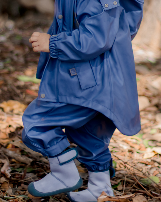 Kids waterproof jacket with mud guard and soft sole boots, durable outdoor play clothing for toddlers